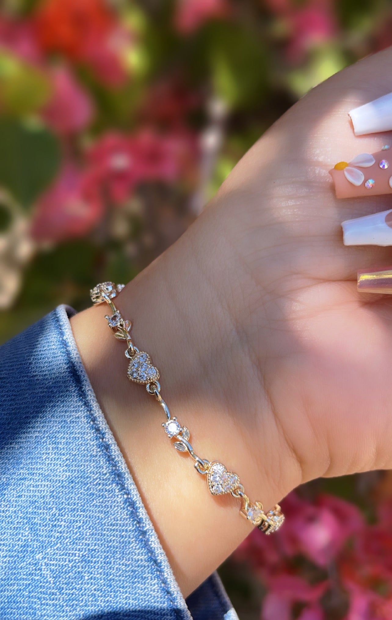 Pulsera de corazón de cristal y flor