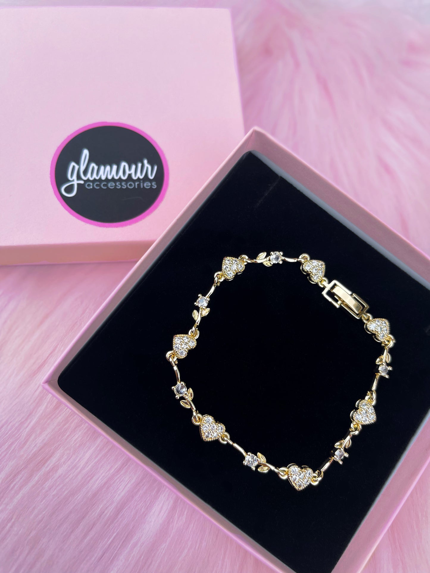 Pulsera de corazón de cristal y flor