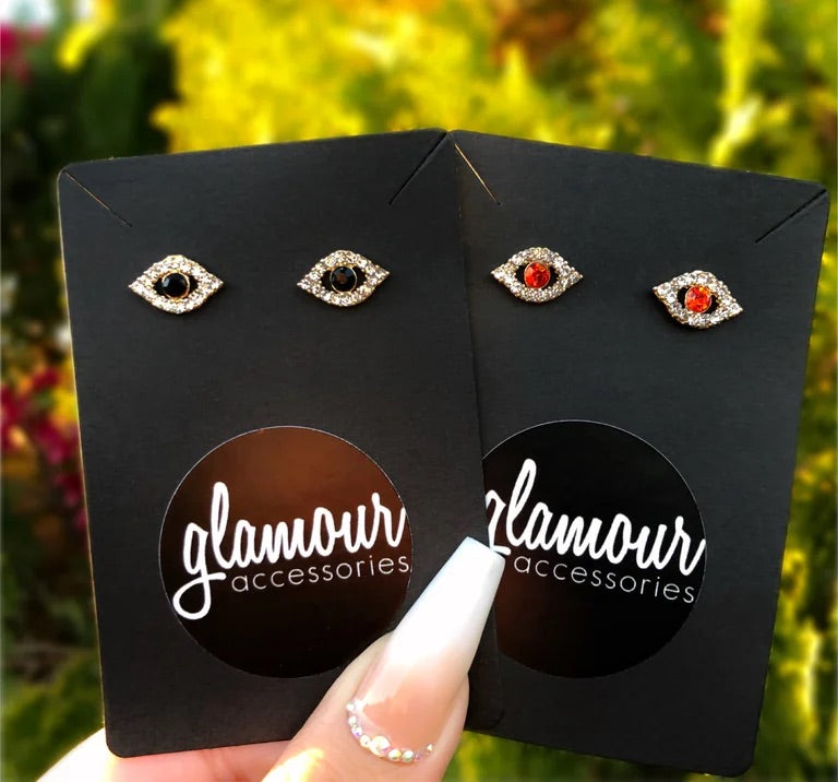 Red eye rhinestone earrings