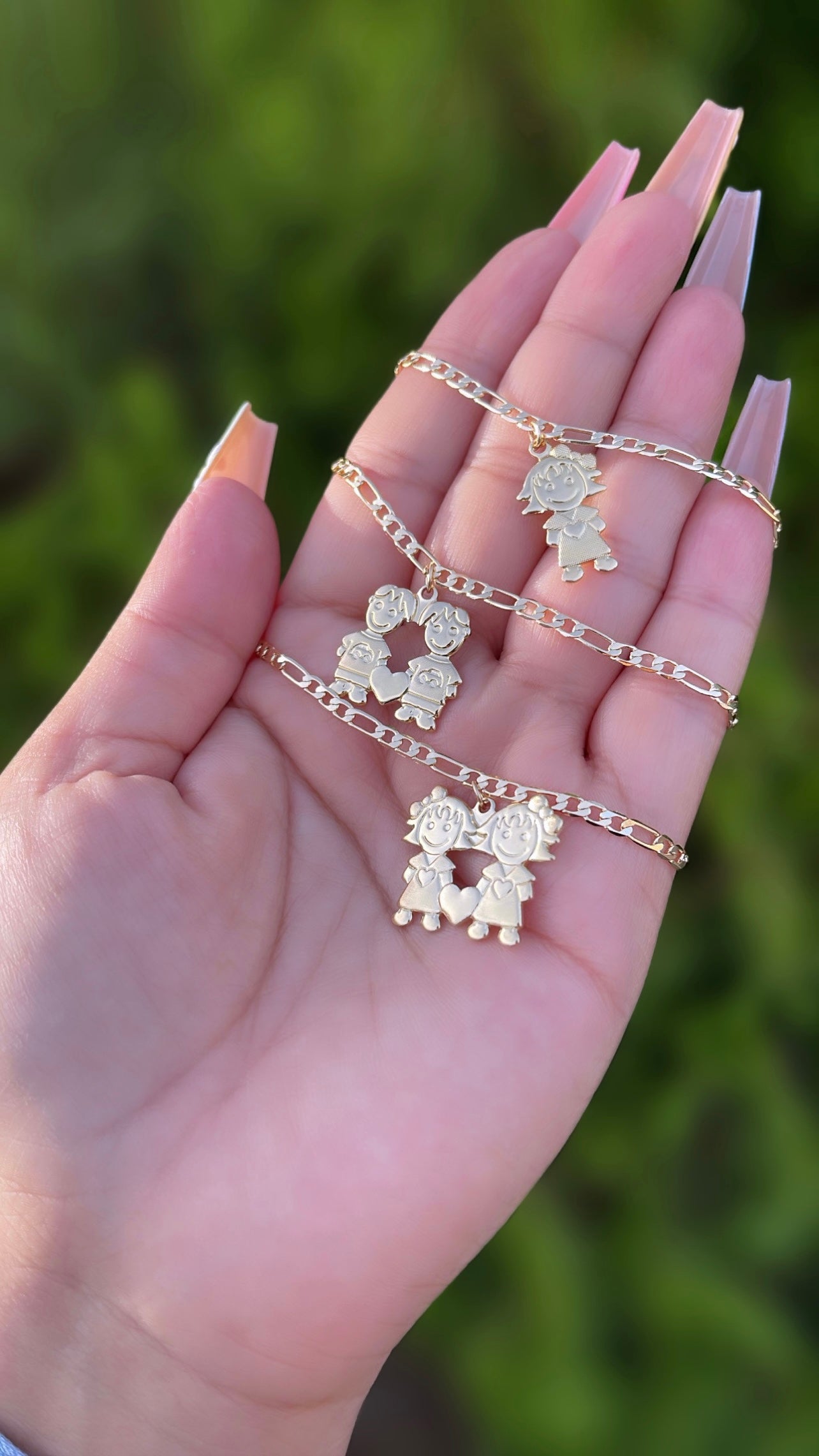 Double child charm bracelet
