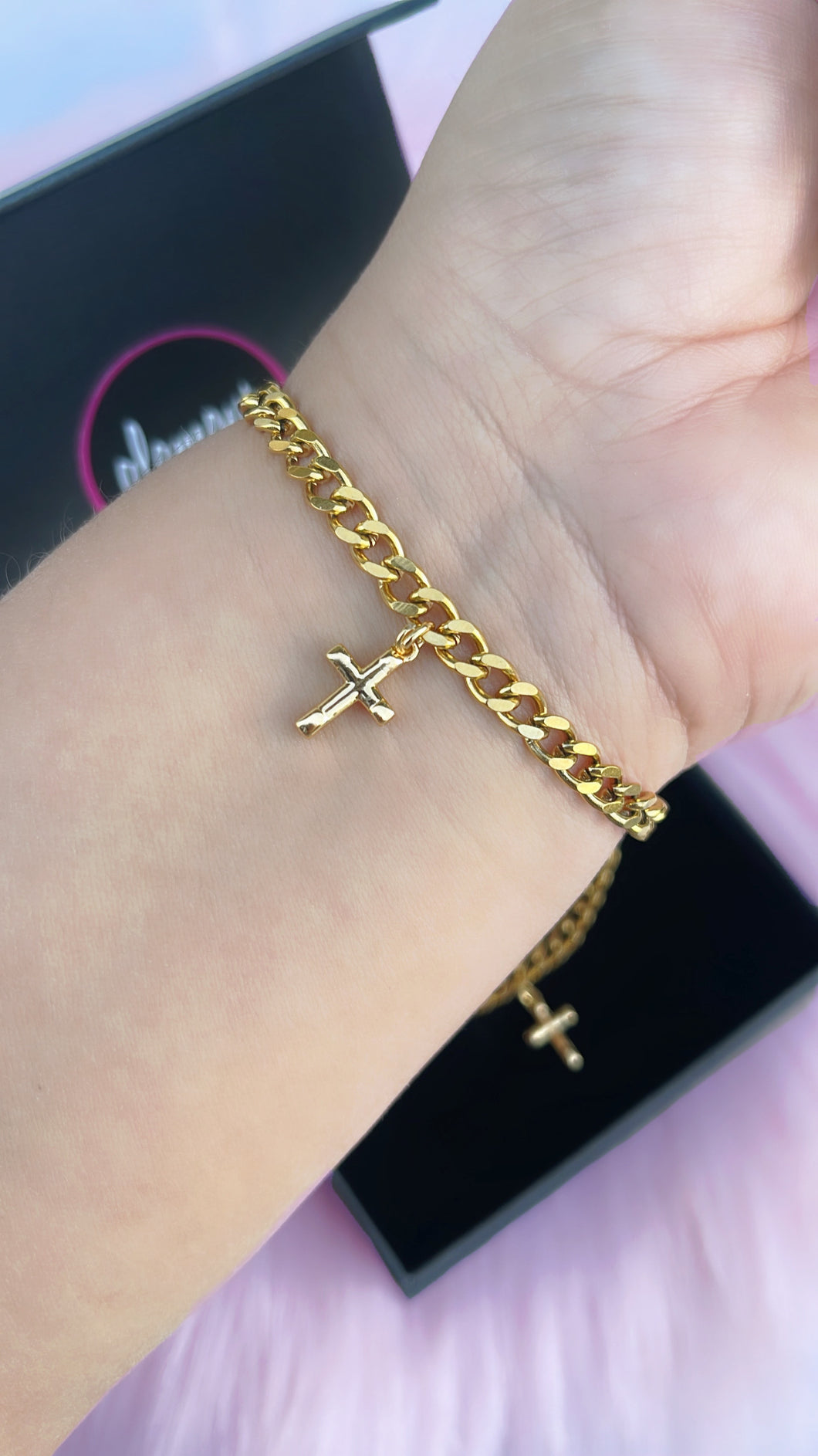 Cross charm bracelet