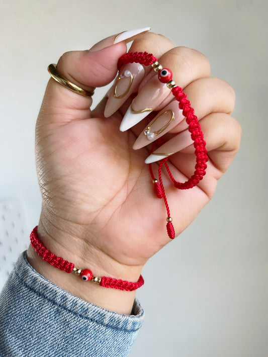 Red braided ojito bracelet