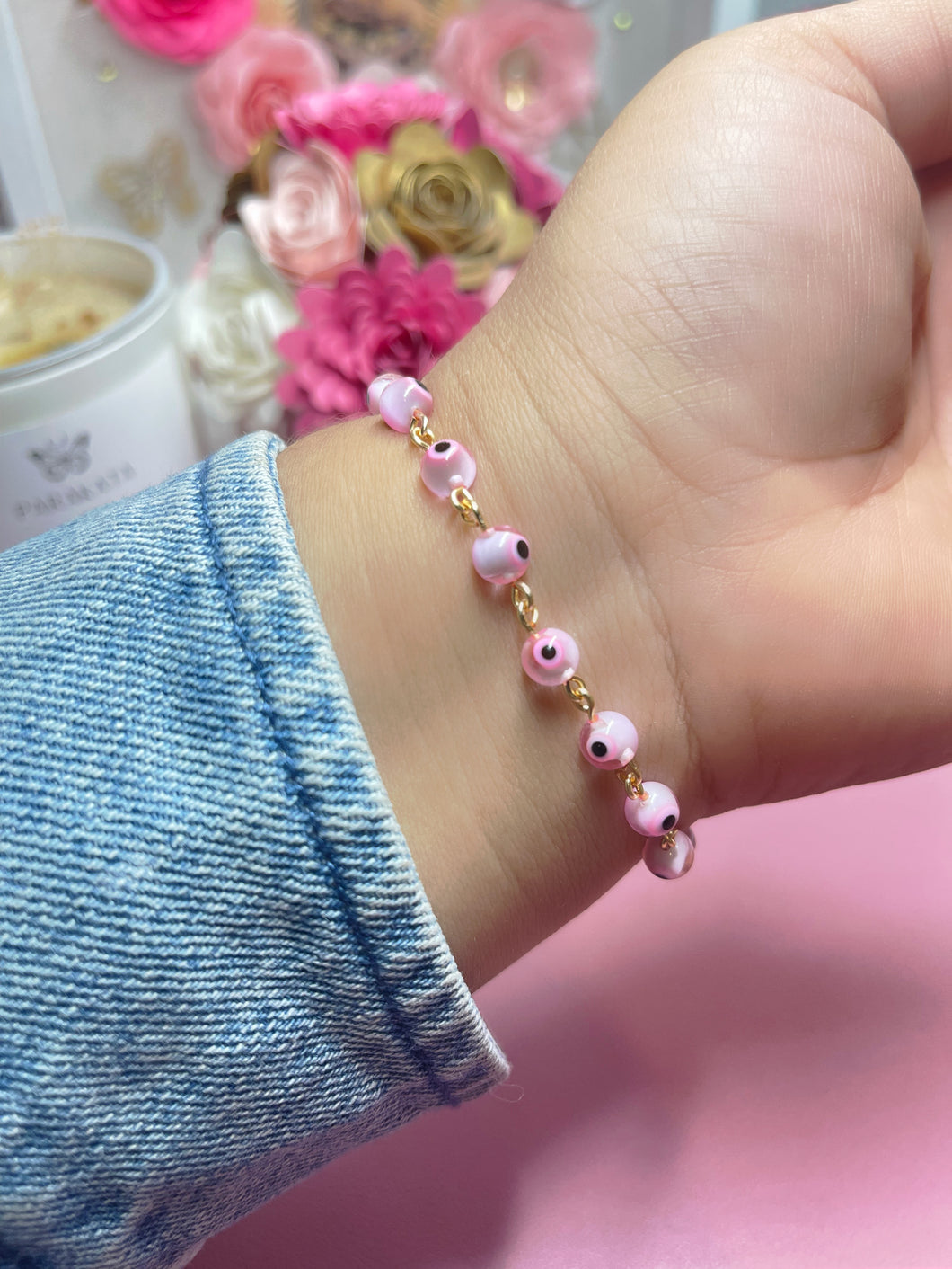 Pink ojito link bracelet