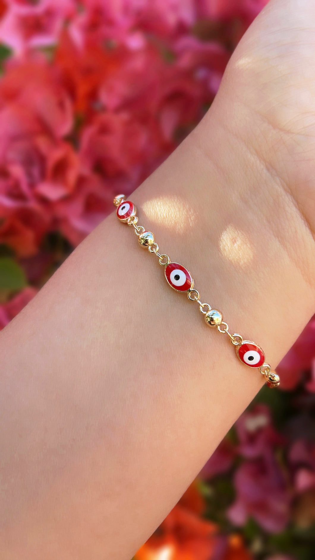 Red oval eye bracelet